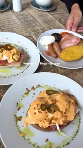 A montage video showcasing the brunch menu, drinks, and location of Social in Rhos-on-Sea, featuring dishes like Sriracha eggs benedict, full Welsh breakfast, and matcha lattes.