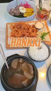 A review of Hankki in London's Chinatown, featuring a variety of Korean dishes including BBQ, soup, noodles, and cocktails. The creator highlights the interactive nature of the BBQ and the quality of the food.