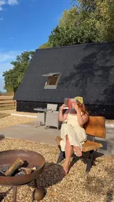 A vibrant and engaging lifestyle reel showcasing a stay at 'The Bright Oak' cabin. The video features a couple enjoying the amenities, including the hot tub, cooking, playing board games, and exploring the surrounding countryside, effectively highlighting the relaxing and fun nature of the staycation.