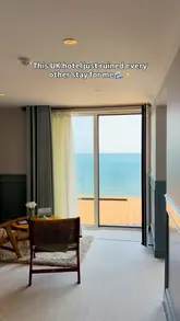 A promotional montage showcasing a stay at The Albion Hotel in Freshwater Bay, Isle of Wight, highlighting the sea views, room interiors, dining experiences, and beach access.