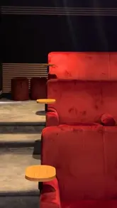 A montage showcasing a boutique cinema experience located at The George Inn in Oakham, featuring the intimate 12-seat cinema room and the outdoor beer garden.