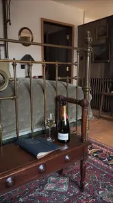 A cinematic montage showcasing a luxury countryside getaway at Ashcombe Estate, featuring outdoor dining, champagne, and estate amenities like wild swimming and a wood-fired sauna.
