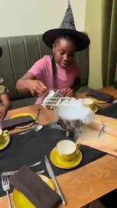 A video showcasing a wizard-themed afternoon tea experience at the Georgian House Hotel, featuring children interacting with dry ice effects, potion-making, and enjoying the tea service.