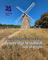 A clear, bright, and well-composed photograph of the historic Bembridge Windmill on the Isle of Wight, set against a vibrant blue sky. The image effectively captures the landmark, providing a clean and inviting visual for potential visitors.