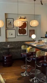 A short, aesthetic montage showcasing the interior, exterior, food, and drinks at Bar Blondie in Queen's Park, London.