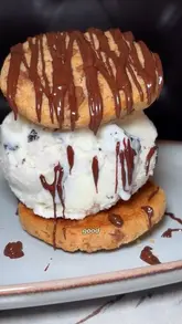A promotional reel featuring a couple visiting the newly opened Gourmet Burger Club in Twickenham, showcasing their premium burgers, steaks, sides, mocktails, and dessert.