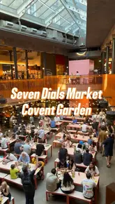 A short, energetic video showcasing a visit to Bleecker Burger at Seven Dials Market. The footage includes the market entrance, the menu, the cooking process on the grill, and the final presentation of burgers and fries.