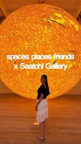 A vlog-style video showcasing a social event organized by 'Spaces Places & Friends' at the Saatchi Gallery, featuring a group of people exploring the 'The Sun and The Moon' art exhibition.