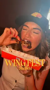 A fast-paced, energetic recap of Wing Fest in Sheffield, featuring close-ups of various chicken wing vendors, live music, axe throwing, and the overall festival atmosphere.
