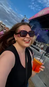 A recap video of the Symphonic Ibiza event in Harrogate, featuring clips of the DJ, live performers, the crowd, and attendees enjoying drinks in an outdoor festival setting.
