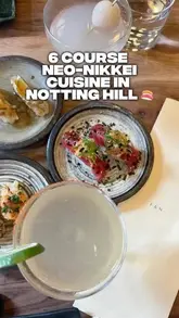 A creator visits a Nikkei fusion restaurant in Notting Hill, showcasing a variety of dishes from a six-course tasting menu, including tuna tiradito, crispy rice, and udon, alongside cocktails. The video highlights the intimate atmosphere and the quality of the food.