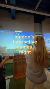 A group of friends visits Clays Bar in London to experience interactive clay target shooting, showcasing the gameplay, cocktails, and food offerings.