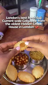 A creator reviews a London chaat house, focusing on their fresh suji golgappe. The video features the creator eating the dish and sharing their enthusiasm, providing an authentic and appetizing look at the street food experience.
