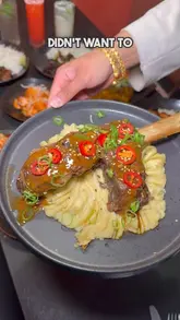 A review-style video showcasing a new menu at Sibu in Batley. The creator highlights several dishes including beef ribs, dynamite prawns, satay chicken, and dessert, providing commentary on the flavors and presentation.