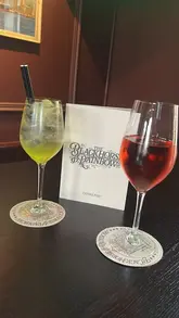 A tour of The Blackhorse & Rainbow in Liverpool, highlighting the main bar, beer garden, rear terrace, and fireplace, while showcasing their cocktail and wine selection.