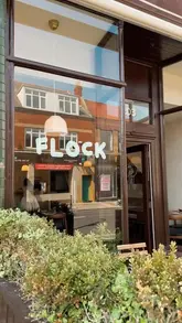 A short video showcasing the interior, menu, and food/drink offerings of a new coffee and wine bar called Flock in Whitley Bay.