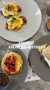 A vlog-style video documenting a family brunch visit to Fego in Ascot, featuring shots of the exterior, the bakery counter, the menu, and the food served, including pancakes, eggs benedict, and iced lattes.