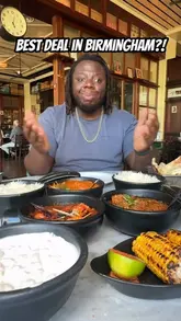 A creator reviews a special set menu offer at Dishoom in Birmingham, showcasing a variety of small plates, curries, sides, and desserts. The video highlights the value of the deal while providing close-up shots of the food and the creator's reaction to the meal.
