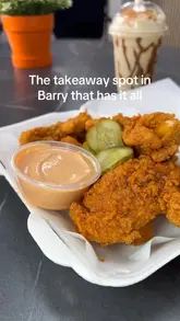 A short, energetic review of a takeaway spot called Salt and Batter, featuring close-up shots of smash burgers, loaded fries, fried chicken tenders, mozzarella dippers, and milkshakes. The video includes the creators trying the food, highlighting the variety of the menu.