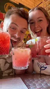 A couple visits Turtle Bay for their 'Island Nights' promotion, showcasing the menu, cocktails, games, and atmosphere.