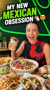 A bright and inviting promotional image featuring a creator holding a burrito, surrounded by a spread of Mexican dishes including a burrito bowl, nachos, and tacos, set against a branded green wall with a neon sign.
