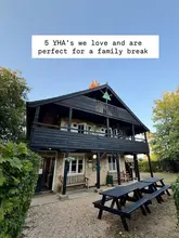 A static image of a YHA building with text overlay introducing a listicle about family-friendly YHA locations.