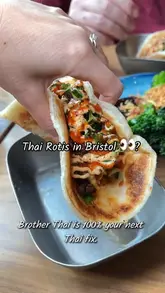 A short vlog-style review of Brother Thai in Bristol, showcasing their signature rotis, fried chicken satay rice bowl, and sides like wontons and broccoli.