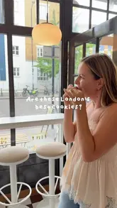 A short, engaging reel showcasing a visit to Tiny Mammoth in London, highlighting various cookie flavors and a cookie gelato cup.
