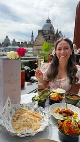 A vlog-style reel showcasing a bottomless brunch experience at a rooftop venue in Leeds, highlighting the Kerala-style tapas, unlimited drinks options, and city views.