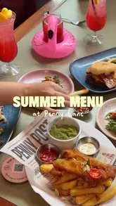 A fast-paced, energetic video showcasing the new summer menu and arcade games at Penny Lane in Nottingham. The video features close-ups of various dishes like fish and chips, burgers, and bao buns, alongside cocktails and gameplay footage, highlighting the venue's fun, nostalgic atmosphere.