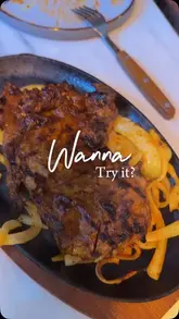A promotional montage for Hunger Steaks, highlighting their sizzling steak dishes, grilled meats, cocktails, and the restaurant's interior decor.