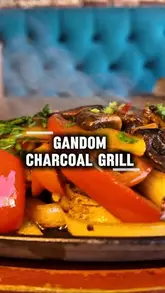 A couple visits a Persian restaurant in Hove, showcasing various lunch and dinner deals, including wraps, a chicken sizzler, ghormeh sabzi, cocktails, and baklava.