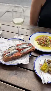A short, engaging video showcasing a collaboration between The Alpaca pub and Steve Hatt fishmongers, featuring close-up shots of fresh seafood dishes like sardines on toast, tuna tartare, and mussels.