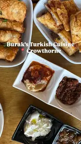A family-focused vlog-style video showcasing a visit to Burak's Turkish Cuisine, featuring shots of the restaurant exterior, interior, various Turkish dishes, and the children enjoying the outdoor seating area.