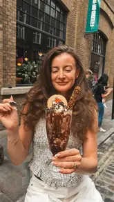 A fast-paced listicle video featuring five different dessert spots in London, showcasing various sweet treats like scoopable cookies, sundaes, tiramisu, marshmallow desserts, and cinnamon rolls.