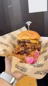 A couple visits The Hungry Cowboy at Tiger Yard in Cardiff Bay, reviewing their burgers, brisket mac and cheese, and loaded fries.