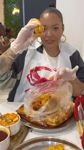 A creator provides an enthusiastic review of a seafood boil restaurant in London, showcasing the hands-on dining experience, the quality of the seafood, and the casual atmosphere.