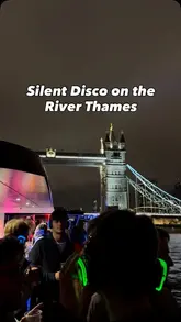 A montage of a silent disco boat party on the River Thames at night, showcasing the crowd dancing with headphones and views of iconic London landmarks like Tower Bridge and The Shard.