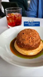 A review of a dinner date at Kelp in Glasgow, featuring various dishes like mushroom polenta, crab donut, smoked croquettes, and a cheese tart.