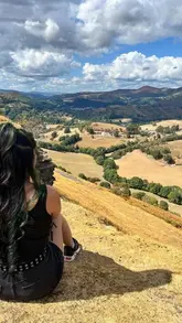 A travel vlog documenting a day trip to Llangollen, Wales, featuring hiking at Castell Dinas Bran, outdoor activities like archery and axe throwing at TNR Outdoors, a visit to the town for a burger, and a walk across the Pontcysyllte Aqueduct.