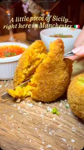A promotional reel for Sicilian NQ in Manchester, featuring a variety of traditional Sicilian dishes including arancini, seafood ravioli, cannelloni, and a selection of cannoli and tiramisu, alongside wine and the restaurant's interior.