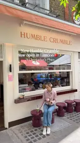 A short, visually appealing promotional video showcasing the preparation and serving of fruit crumbles at the new Humble Crumble location in St Christopher's Place, London.