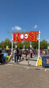 A montage of various food vendors at the Roost Chicken Festival held at Allianz Stadium, showcasing a variety of chicken dishes, ribs, and desserts.