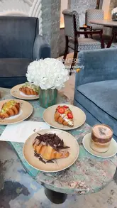 A promotional video for 'La Croissanterie,' a pop-up concept located within the Four Seasons Hotel London at Park Lane, showcasing their range of sweet and savoury croissants in a luxurious lounge setting.