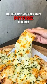 A fast-paced promotional reel for Pitfire Slice Bar, featuring close-ups of various pizza slices, garlic bread, and a dessert, interspersed with shots of the venue's interior.