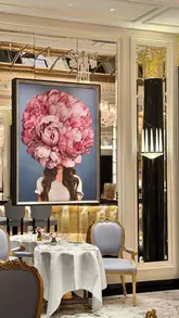 A montage of high-quality, slow-paced shots showcasing the opulent interior, table settings, and food offerings at The Promenade in The Dorchester hotel, London.