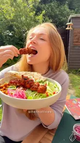 A recipe tutorial demonstrating how to assemble a tikka kebab bowl using plant-based skewers, featuring clear preparation steps and appetizing close-ups of the ingredients.