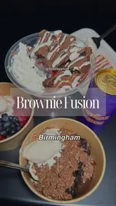 A short, punchy reel showcasing various indulgent desserts and drinks from Brownie Fusion, featuring close-ups of sundaes, brownies, and a signature drink, presented in a casual, takeaway-focused setting.