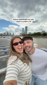 A couple documents their surprise date on a London dining cruise, highlighting the scenic views of landmarks like the London Eye and Big Ben, while promoting the Klook app for booking similar experiences.
