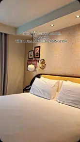 A short, aesthetic reel showcasing a staycation at The Cura Hotel Kensington, featuring shots of the hotel room, a welcome dessert, dinner at the hotel restaurant, and breakfast the following morning.
